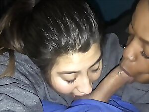 Uninhibited Latina and petite dark-haired beauty share a mouth-watering blowjob with a well-hung hunk in this FFM action re-upload.